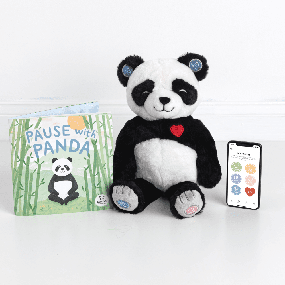 Pause with Panda storybook sitting next to stuffed animal and smartphone with app