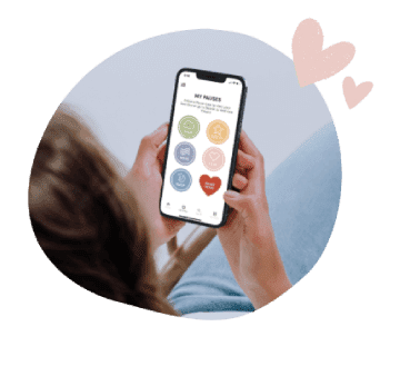 Woman holding Pause with Panda phone and app with pink illustrated heart detail